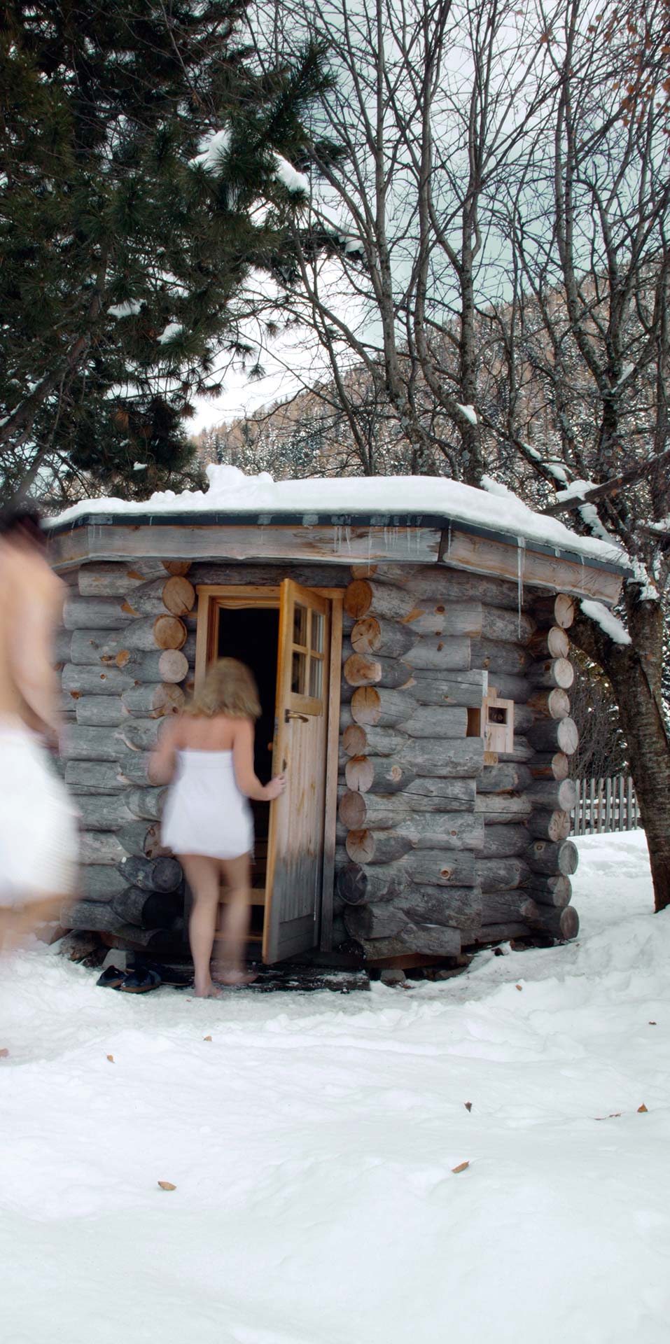 Wooden sauna in snowy landscape at the new Ganis Resort Dolomites