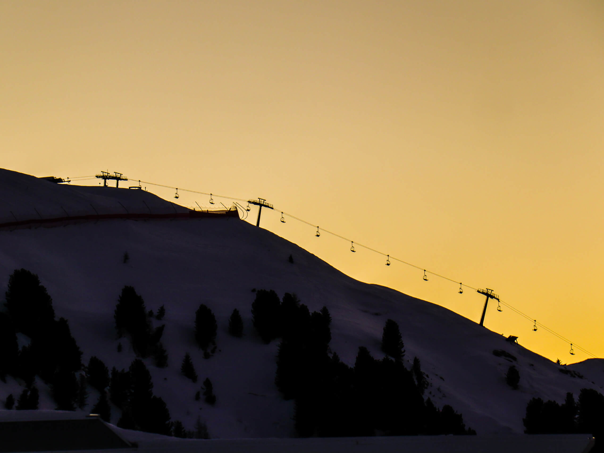 Ganis Experiences Dolomites Early Morning Skiing on the slopes of the dolomites